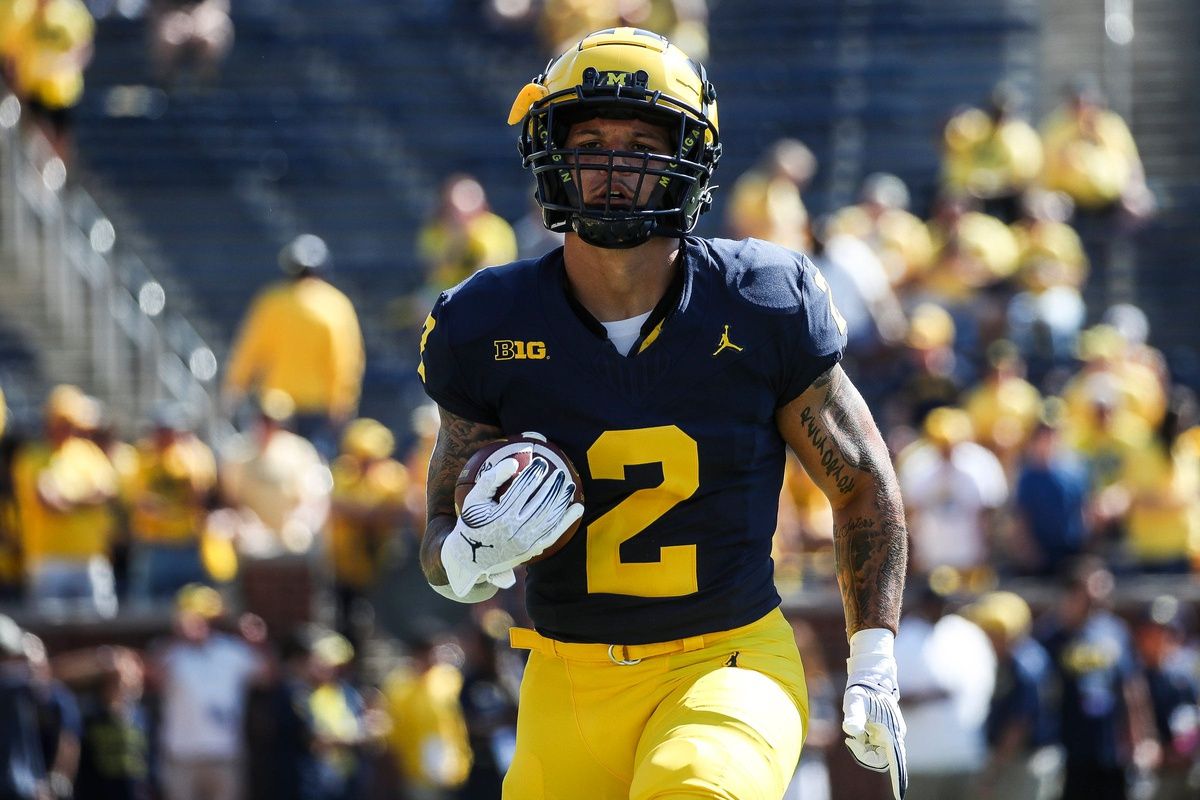 Blake Corum (2) warms up before the East Carolina game at Michigan Stadium.