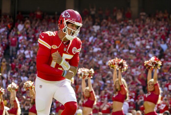 Patrick Mahomes (15) takes the field prior to a game against the Chicago Bears at GEHA Field at Arrowhead Stadium.