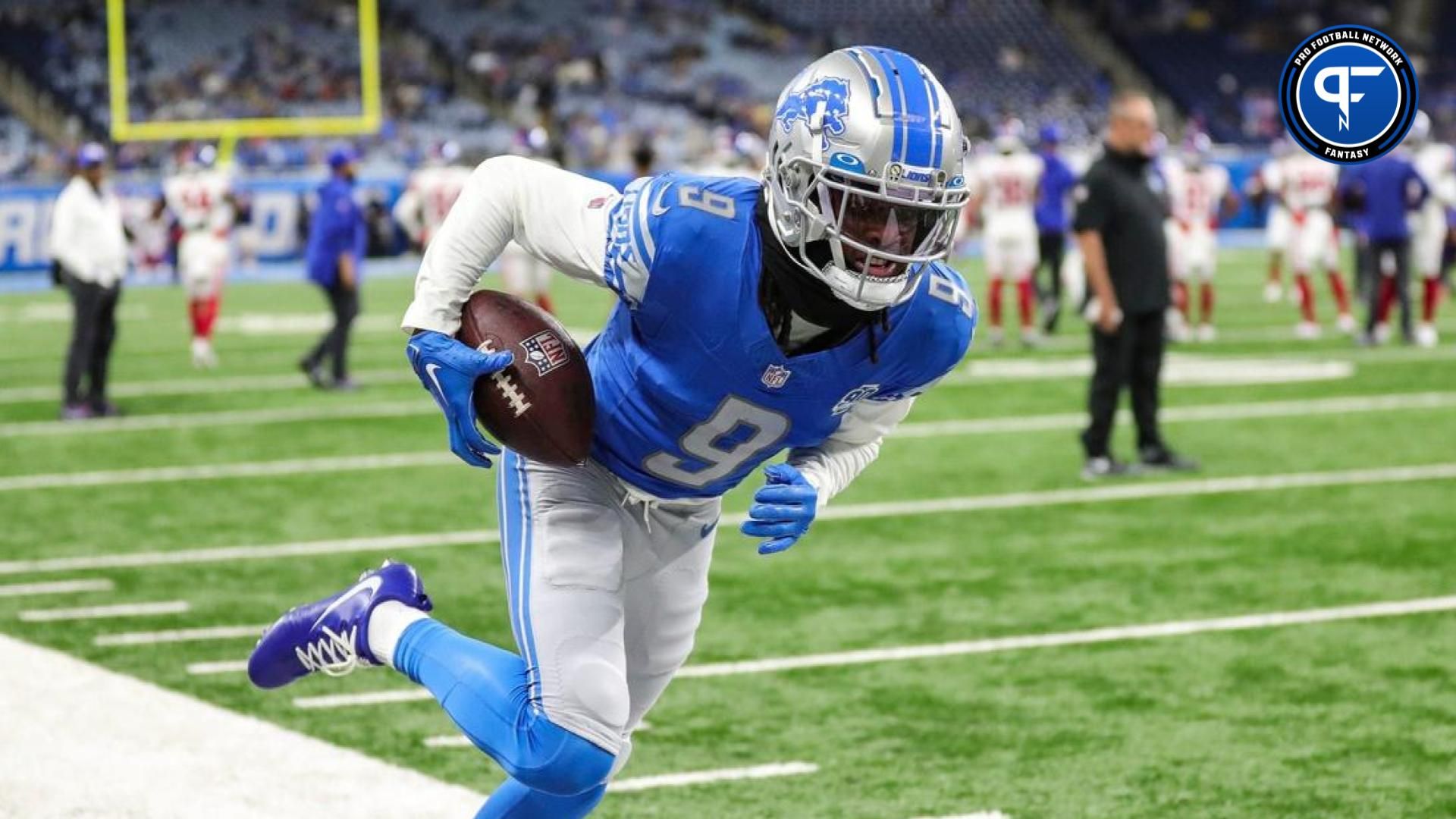 Jameson Williams makes a catch at warm up before a preseason game against the Giants at Ford Field.