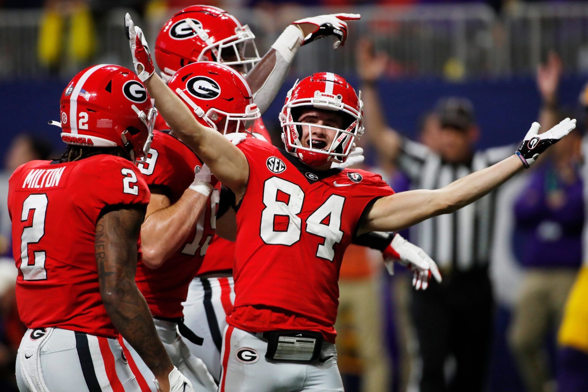 Ladd McConkey (84) celebrates after scoring a touchdown during the first half of the SEC Championship.