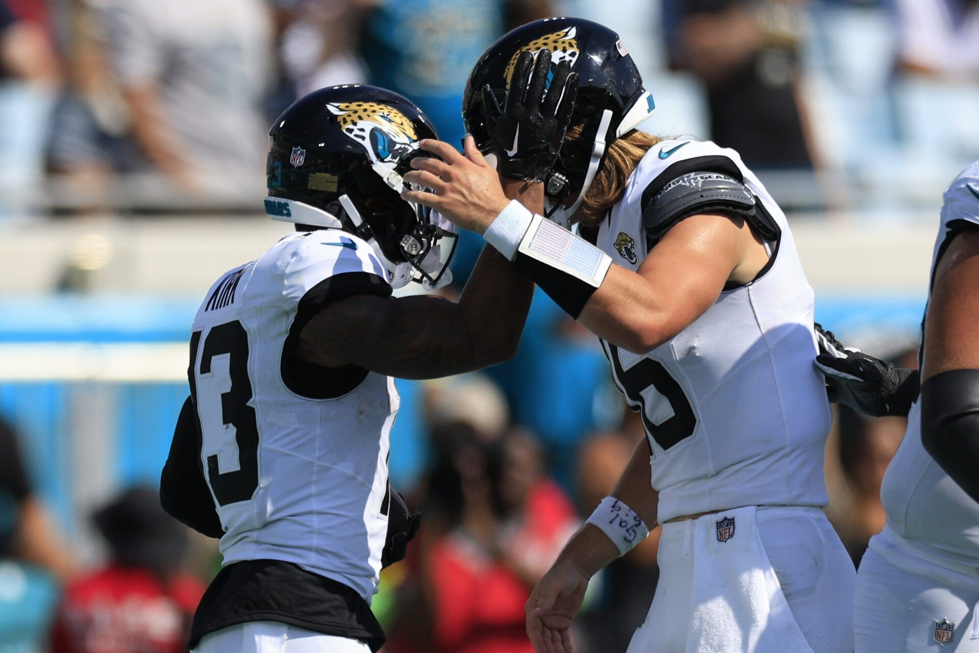 Jaguars wide receiver Christian Kirk, left, is congratulated by quarterback Trevor Lawrence after a touchdown during the fourth quarter against the Texans at EverBank Stadium.