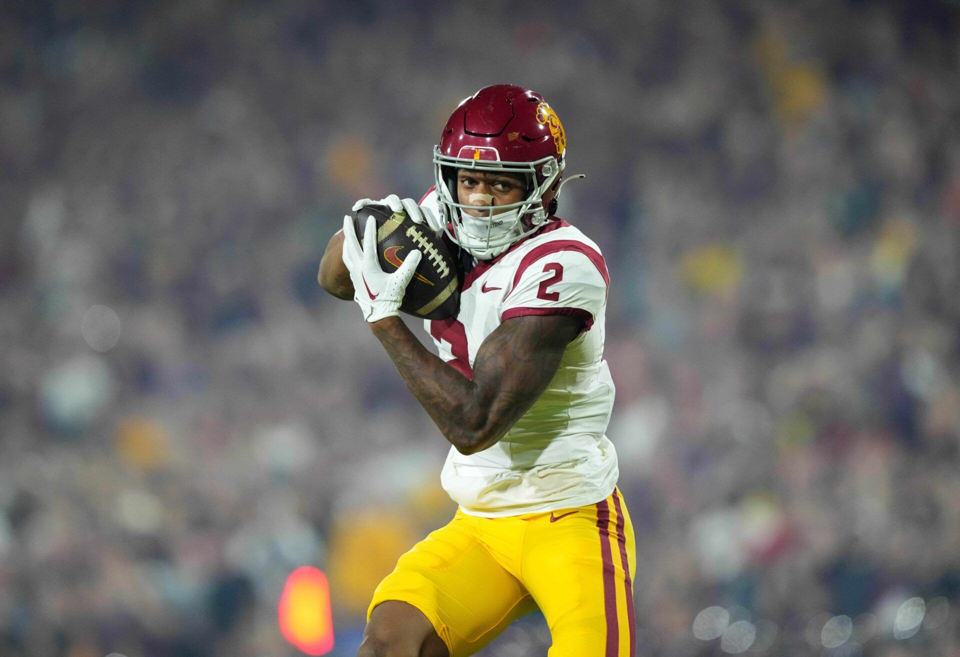 Brenden Rice (2) catches a touchdown pass against the Arizona State Sun Devils during the first half at Mountain America Stadium, Home of the ASU Sun Devils.