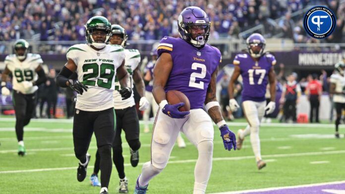 Alexander Mattison (2) scores a touchdown during the second quarter at U.S. Bank Stadium.