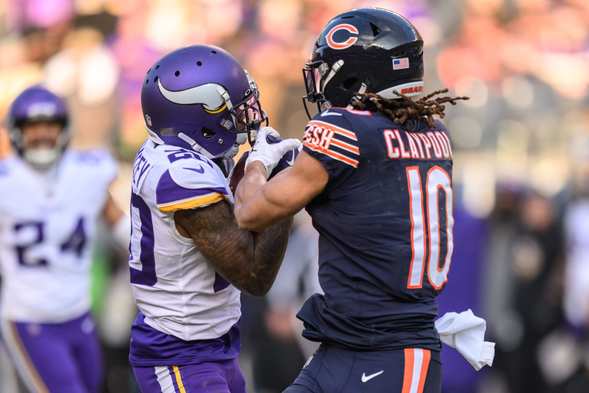 Jan 8, 2023; Chicago, Illinois, USA; Minnesota Vikings cornerback Duke Shelley (20) intercepts a pass intended for Chicago Bears wide receiver Chase Claypool (10) during the fourth quarter at Soldier Field. Mandatory Credit: Daniel Bartel-USA TODAY Sports