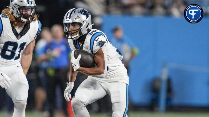 Carolina Panthers RB Chuba Hubbard (30) runs the ball.