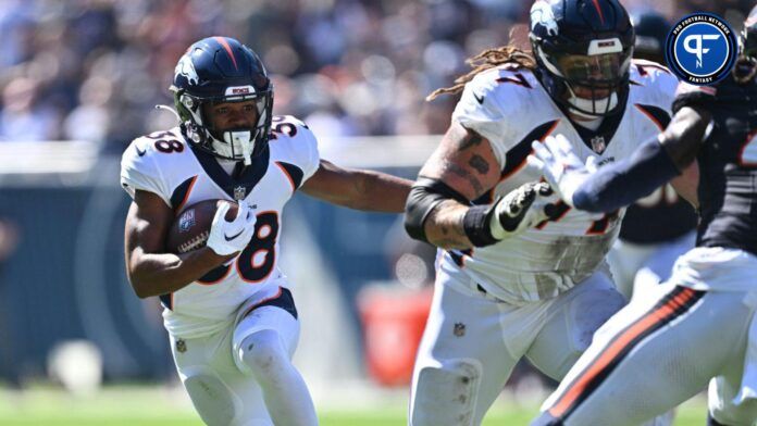 Jaleel McLaughlin (38) takes off on an 18-yard touchdown run in the first quarter against the Chicago Bears at Soldier Field.