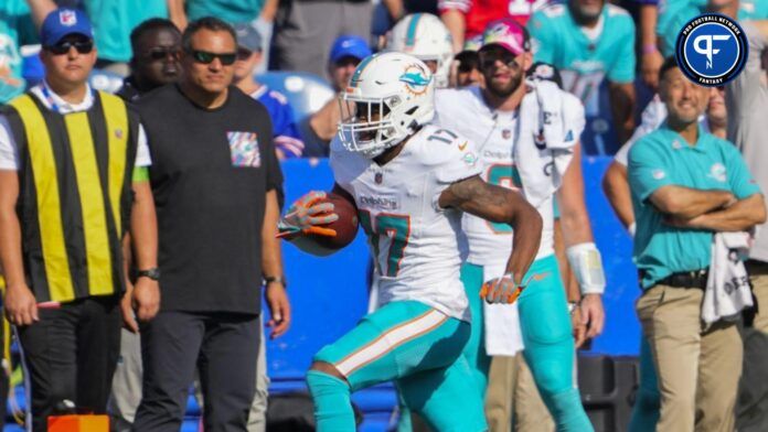 Jaylen Waddle (17) runs with the ball after making a catch against the Buffalo Bills during the second half at Highmark Stadium.