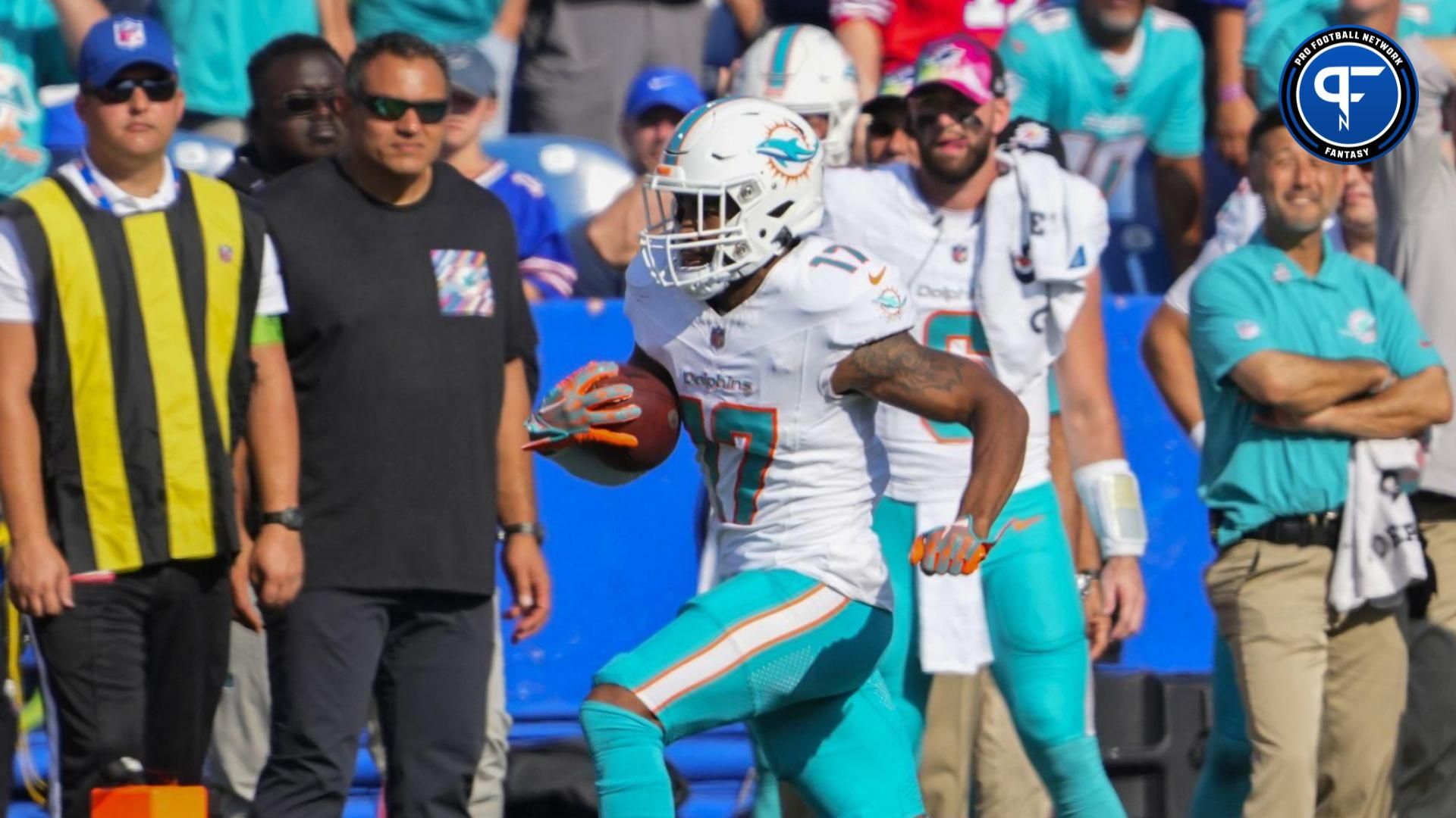 Jaylen Waddle (17) runs with the ball after making a catch against the Buffalo Bills during the second half at Highmark Stadium.