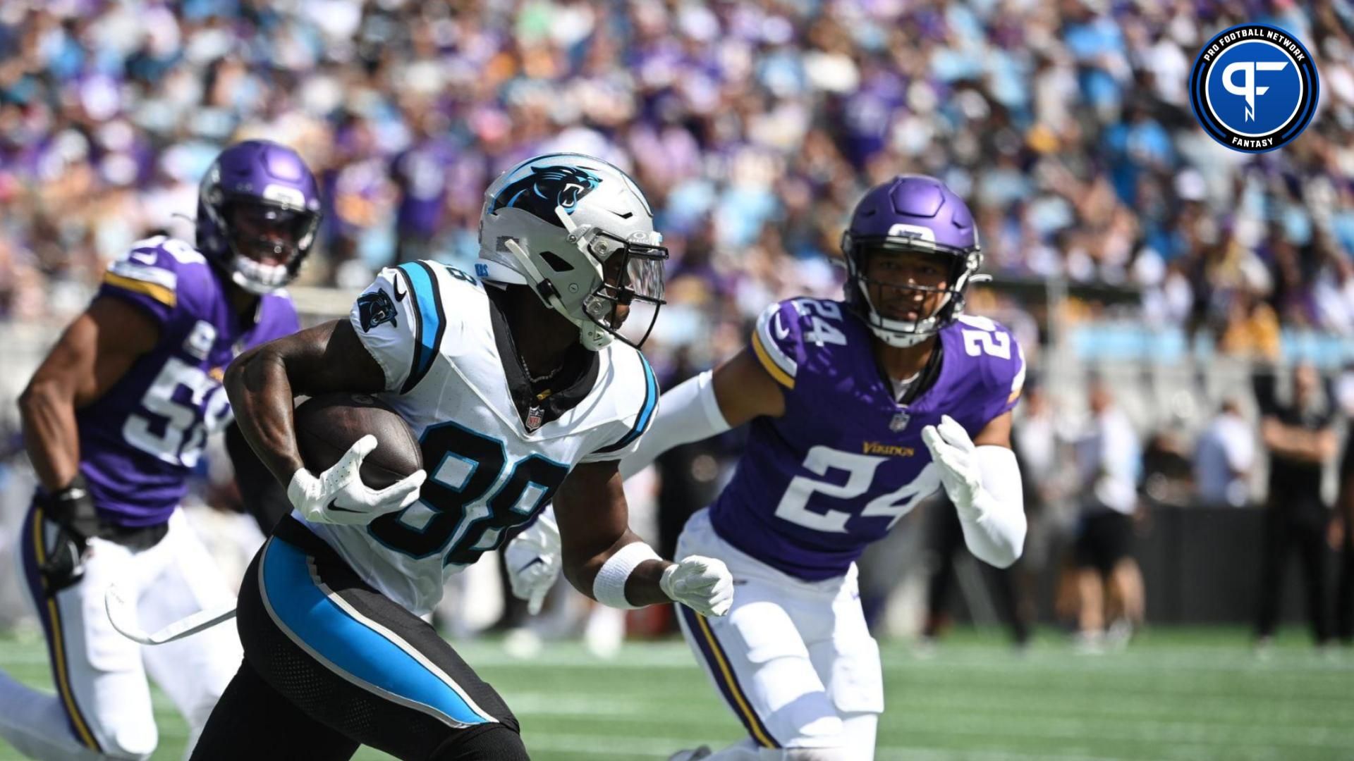 Terrace Marshall Jr. (88) with the ball as Minnesota Vikings safety Camryn Bynum (24) defends in the second quarter at Bank of America Stadium.