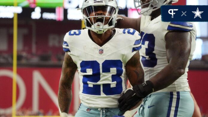 Dallas Cowboys RB Rico Dowdle (23) celebrates after scoring a touchdown.