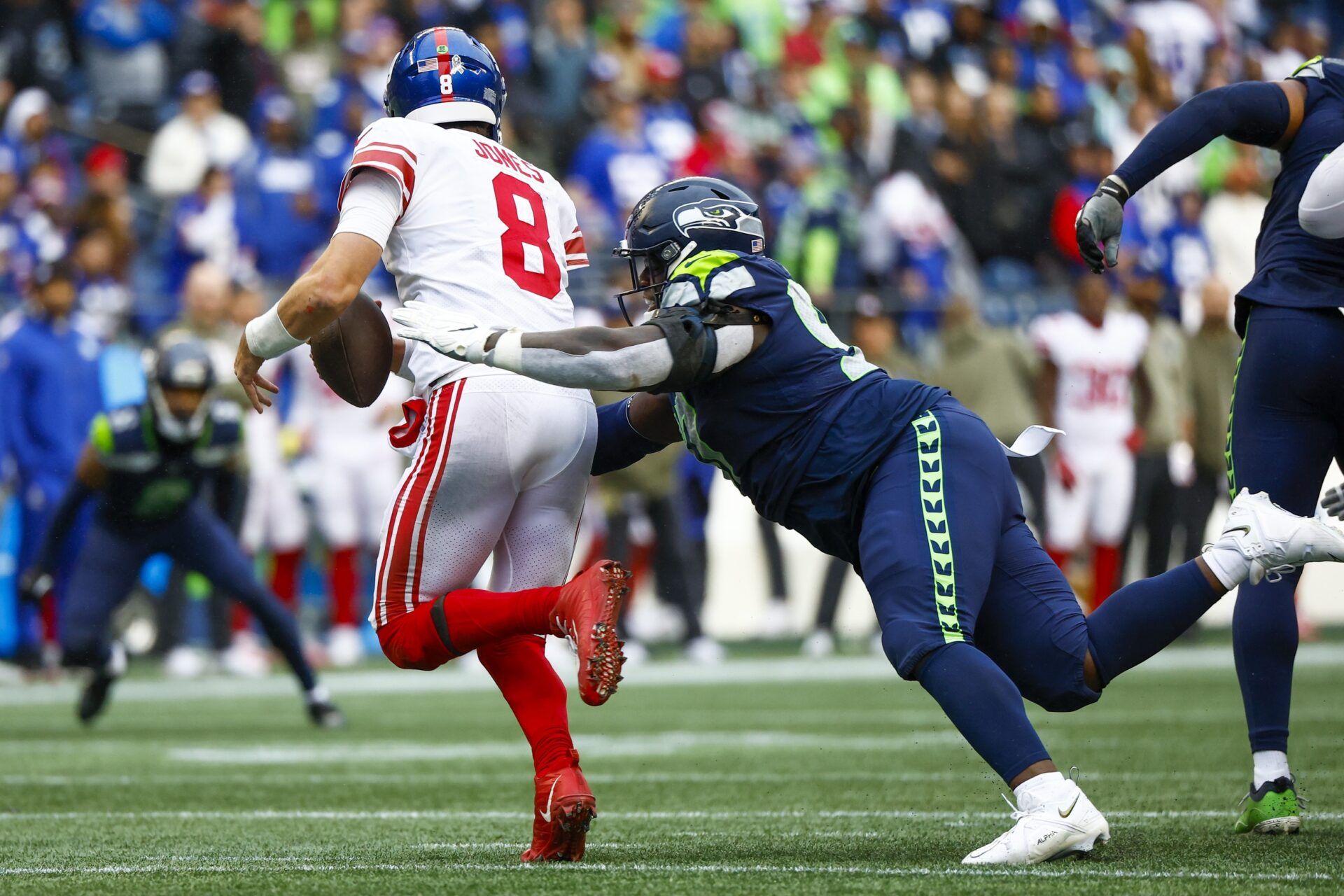 New York Giants quarterback Daniel Jones gets sacked by the Seattle Seahawks.