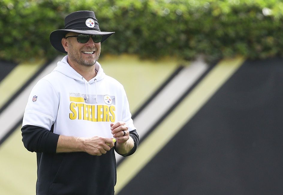 Pittsburgh Steelers offensive coordinator smiles during rookie minicamp.