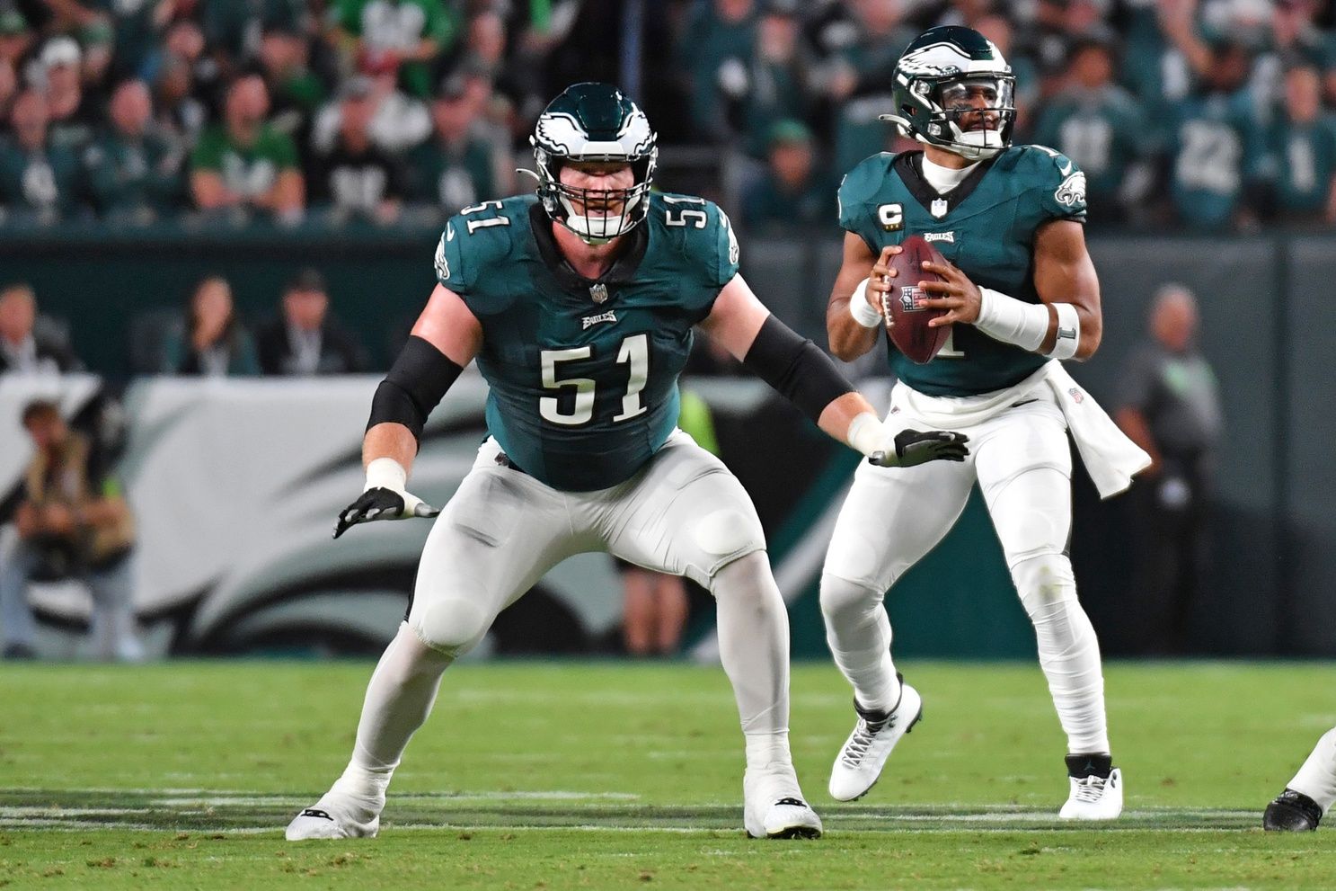 Cam Jurgens (51) protects quarterback Jalen Hurts (1) against the Minnesota Vikings at Lincoln Financial Field.