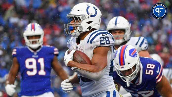 Jonathan Taylor (28) runs into the end zone for a touchdown against the Buffalo Bills during the second half at Highmark Stadium.