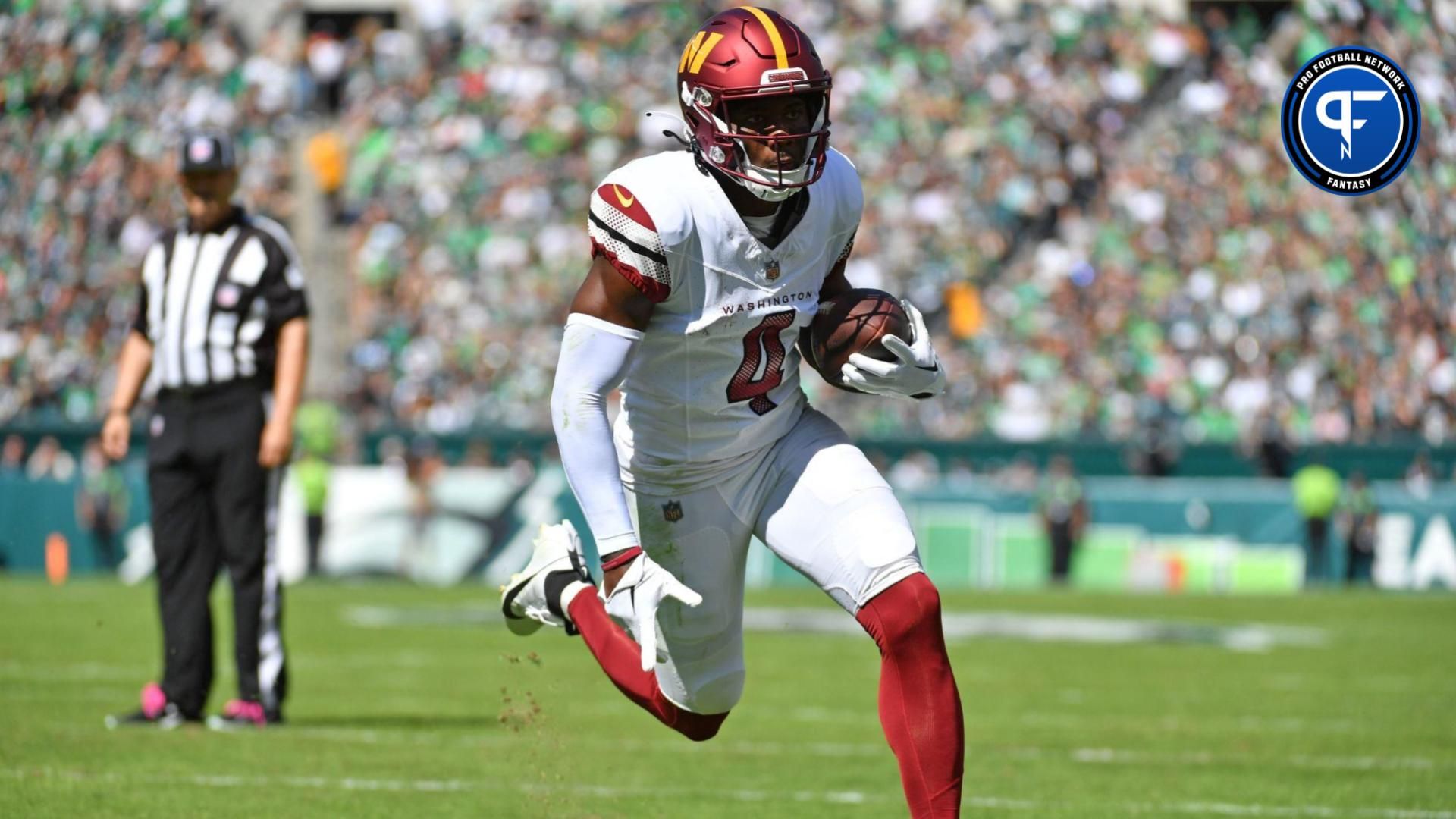 Washington Commanders wide receiver Curtis Samuel (4) scores on a one- yard touchdown run against the Philadelphia Eagles during the first quarter at Lincoln Financial Field.