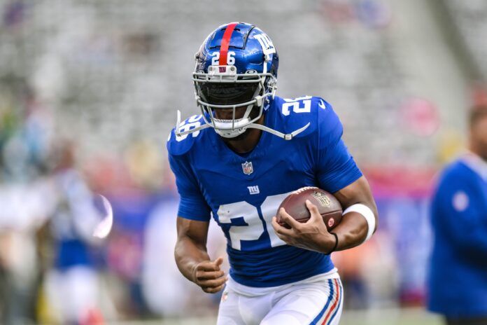 New York Giants RB Saquon Barkley warms up.