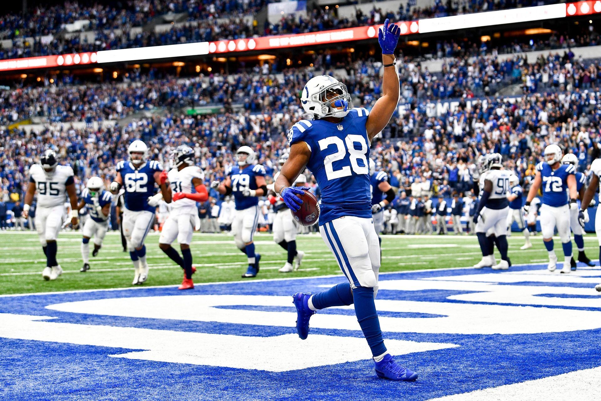 Indianapolis Colts running back Jonathan Taylor (28) scores a touchdown late in the fourth quarter at Lucas Oil Stadium Sunday, Oct. 31, 2021 in Indianapolis, Ind.