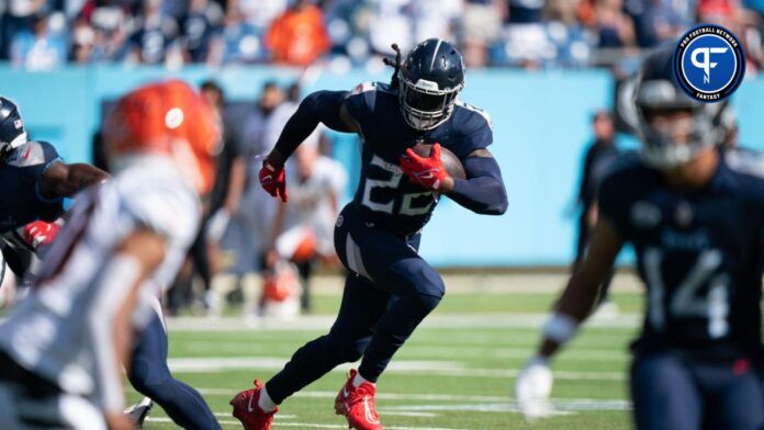 Tennessee Titans running back Derrick Henry (22) breaks off a big run against the Cincinnati Bengals in the final minutes at Nissan Stadium in Nashville, Tenn., Sunday, Oct. 1, 2023.