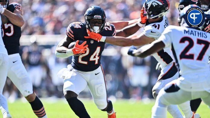 Chicago Bears running back Khalil Herbert (24) runs for yardage in the second quarter against the Denver Broncos at Soldier Field.