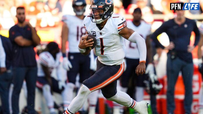 Chicago Bears quarterback Justin Fields (1) runs the ball during the second half against the Kansas City Chiefs at GEHA Field at Arrowhead Stadium.