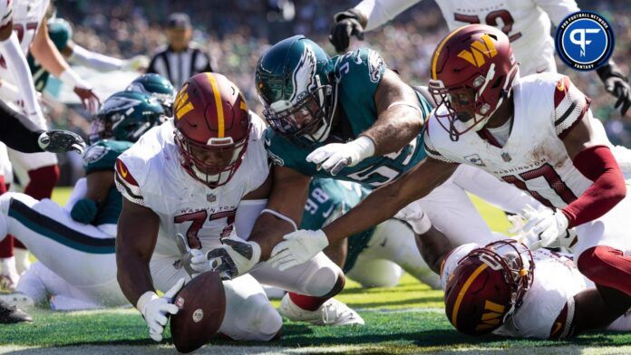 Washington Commanders wide receiver Terry McLaurin attempts to recover a fumble against the Philadelphia Eagles.