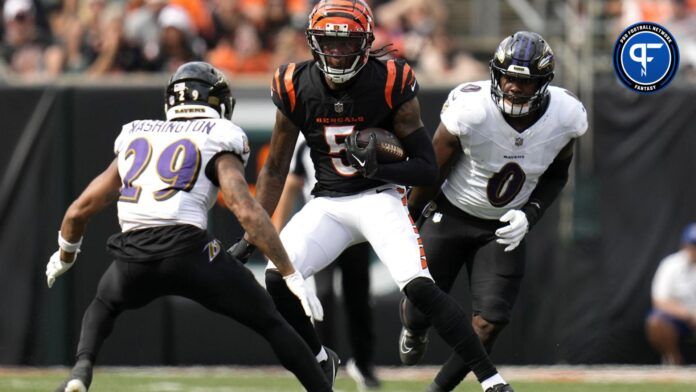 Cincinnati Bengals WR Tee Higgins (5) runs after the catch against the Baltimore Ravens.