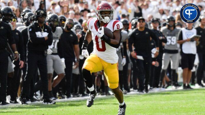 MarShawn Lloyd (0) turns it up field on the way for a touchdown in the first quarter against the Colorado Buffaloes at Folsom Field.