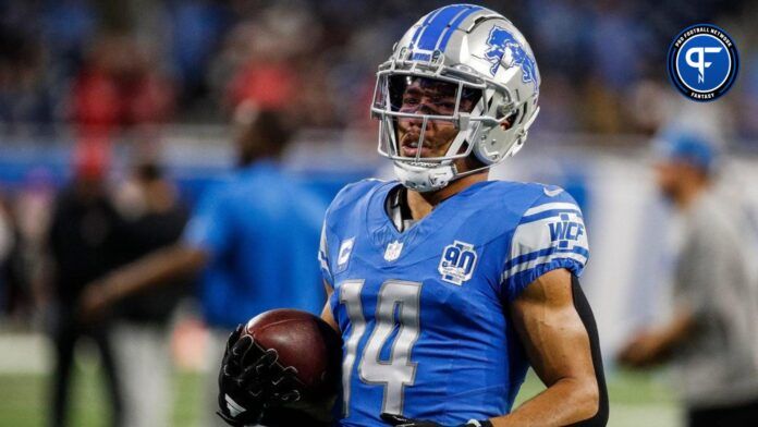 Detroit Lions WR Amon-Ra St. Brown (14) warms up before a game.