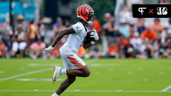 Cincinnati Bengals WR Tee Higgins (5) runs during training camp.