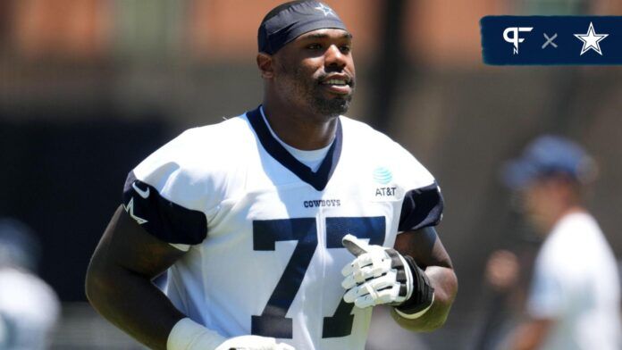 Dallas Cowboys OL Tyron Smith (77) jogs during training camp.