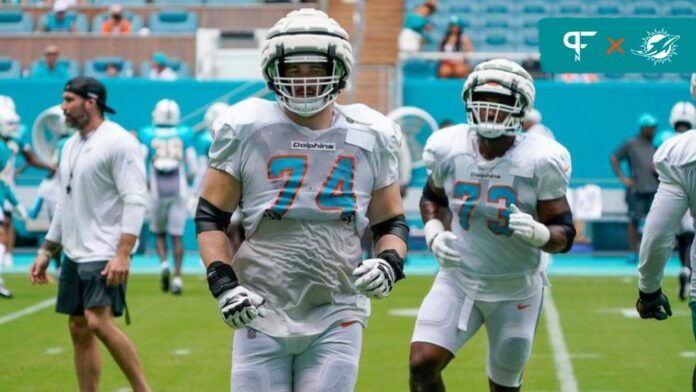 Miami Dolphins OL Liam Eichenberg (74) warming up before a scrimmage.