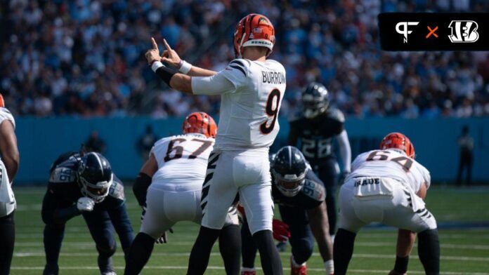 Joe Burrow (9) readies a play against the Tennessee Titans in the fourth quarter at Nissan Stadium.