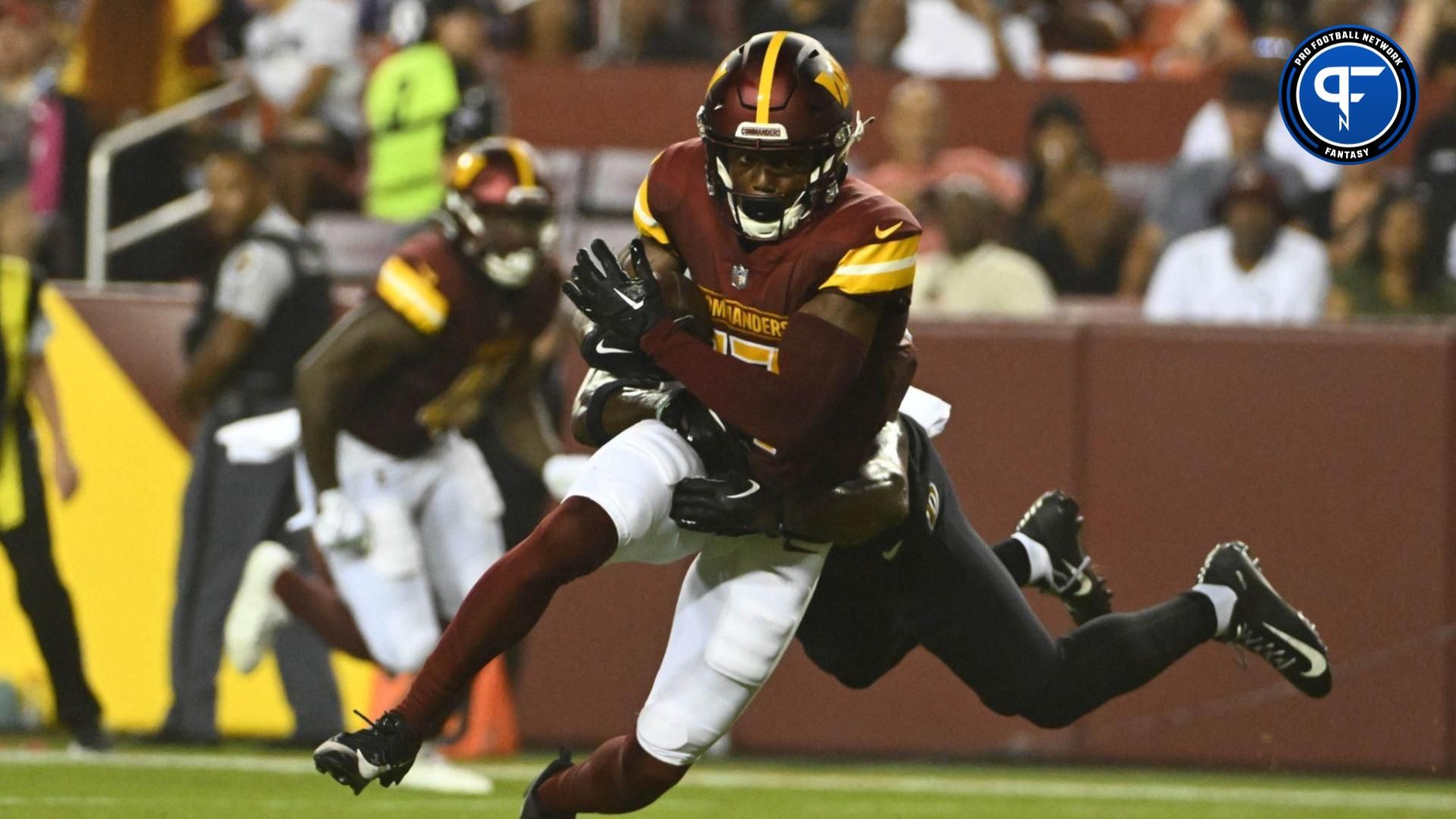 Terry McLaurin (17) runs after a catch during the first half at FedExField.