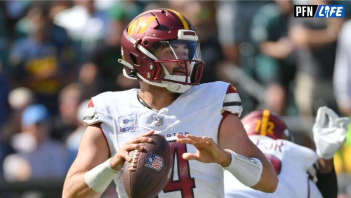 Washington Commanders quarterback Sam Howell (14) throws a pass against the Philadelphia Eagles during the second quarter at Lincoln Financial Field.