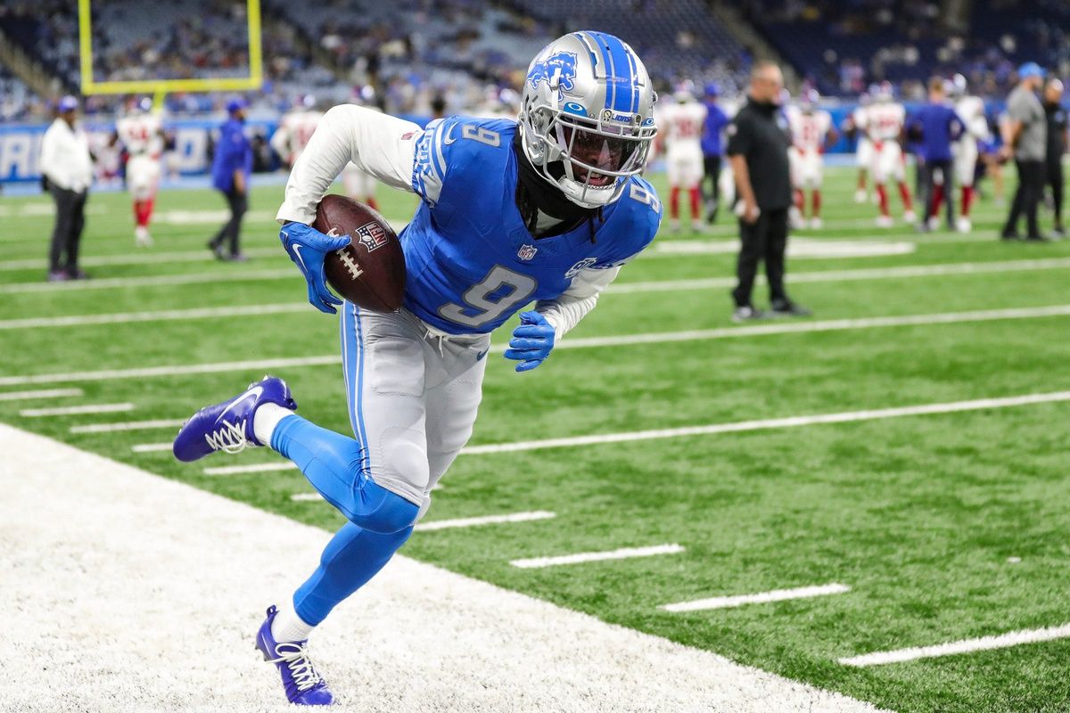 Jameson Williams makes a catch at warm up before a preseason game against the Giants.