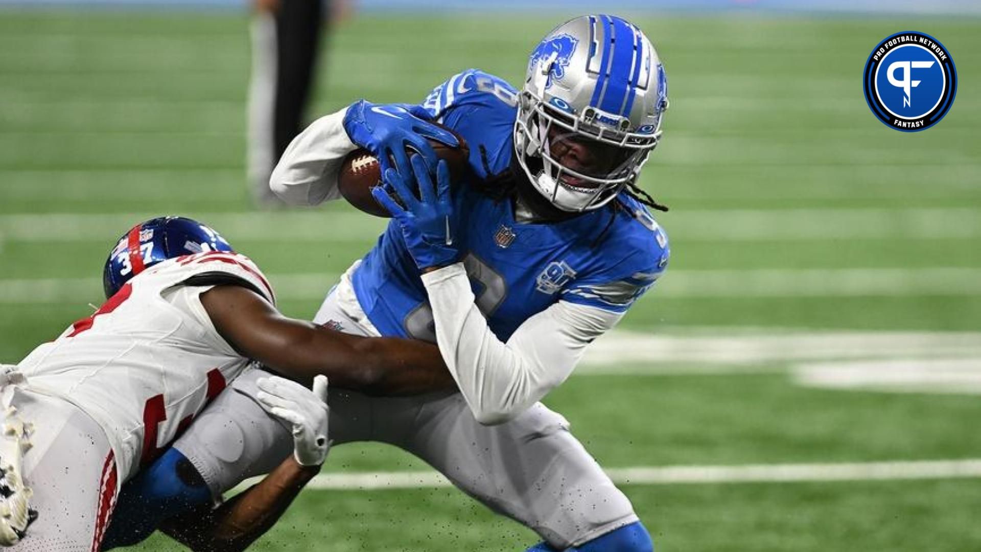 Detroit Lions wide receiver Jameson Williams (9) gets tackled by New York Giants cornerback Tre Hawkins III (37) after catching a pass in the first quarter at Ford Field.