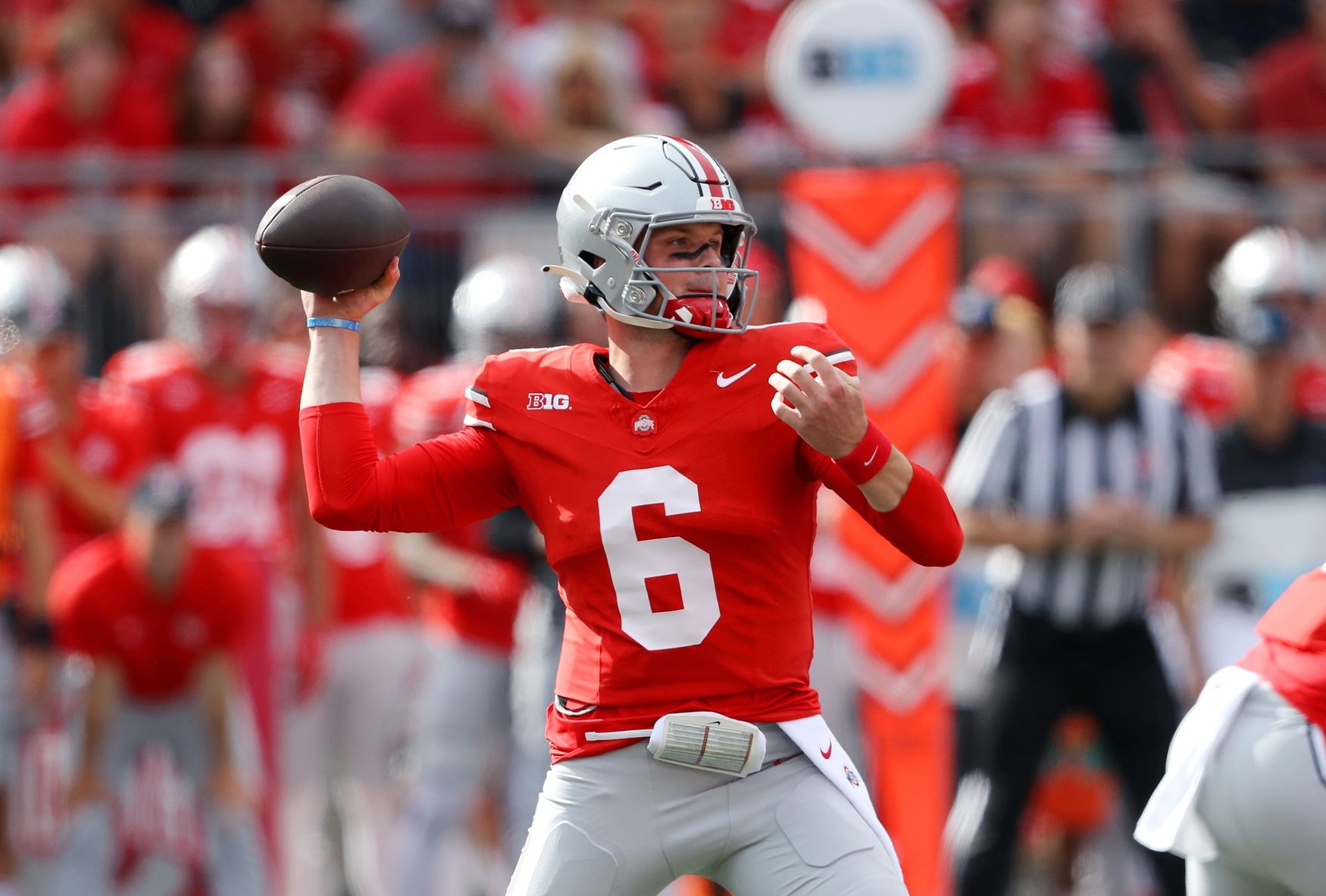 Ohio State Buckeyes QB Kyle McCord (6) throws a pass.