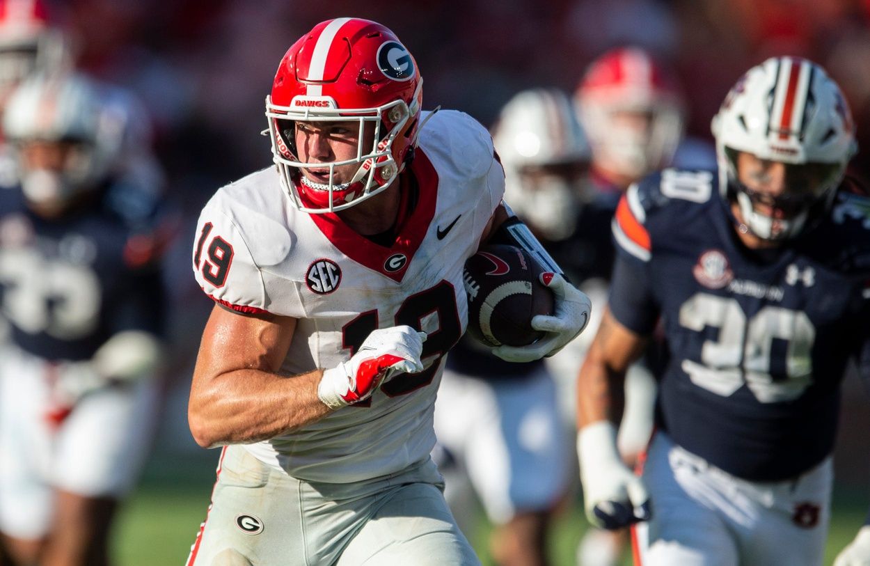 Georgia Bulldogs TE Brock Bowers (19) runs after the catch against Auburn.