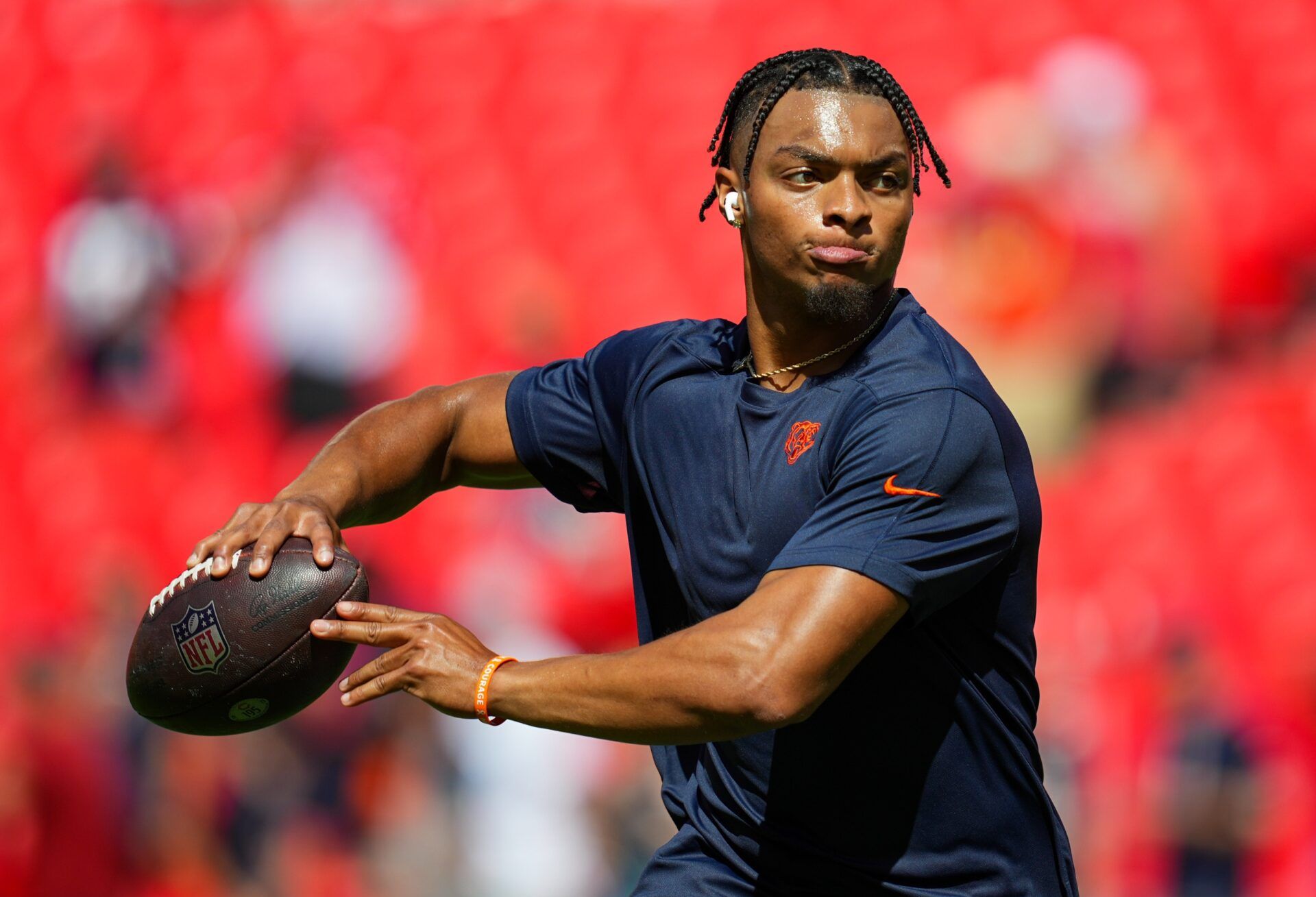 Chicago Bears quarterback Justin Fields warms up.