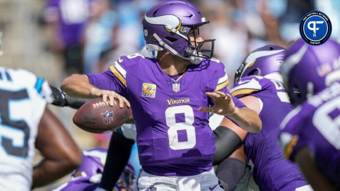 Minnesota Vikings QB Kick Cousins steps up the pass vs. the Carolina Panthers.