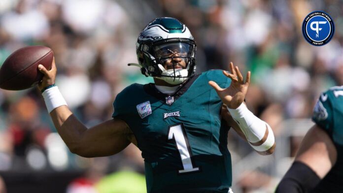 Philadelphia Eagles QB Jalen Hurts steps up to pass in game vs. the Washington Commanders.