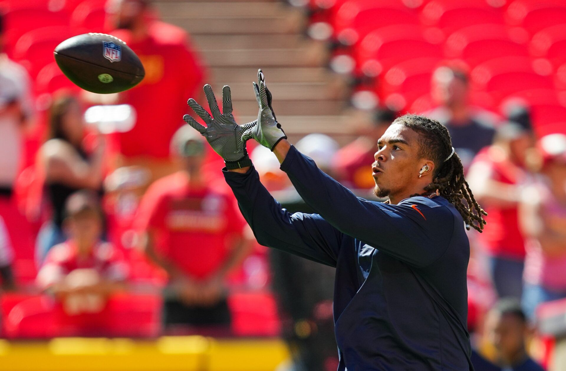 Chicago Bears WR Chase Claypool warms up before a game against the Kansas City Chiefs.