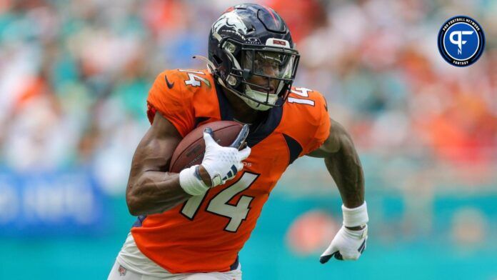 Denver Broncos WR Courtland Sutton (14) runs after the catch.