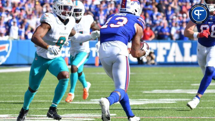 Buffalo Bills wide receiver Gabe Davis (13) catches a pass as Miami Dolphins cornerback Kelvin Joseph (9) defends.