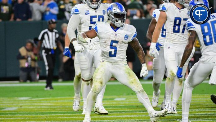 Detroit Lions RB David Montgomery (5) reacts after a touchdown.