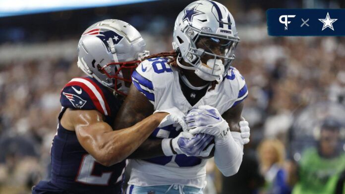 CeeDee Lamb (88) catches a touchdown pass against New England Patriots cornerback Myles Bryant (27) in the first quarter at AT&T Stadium.