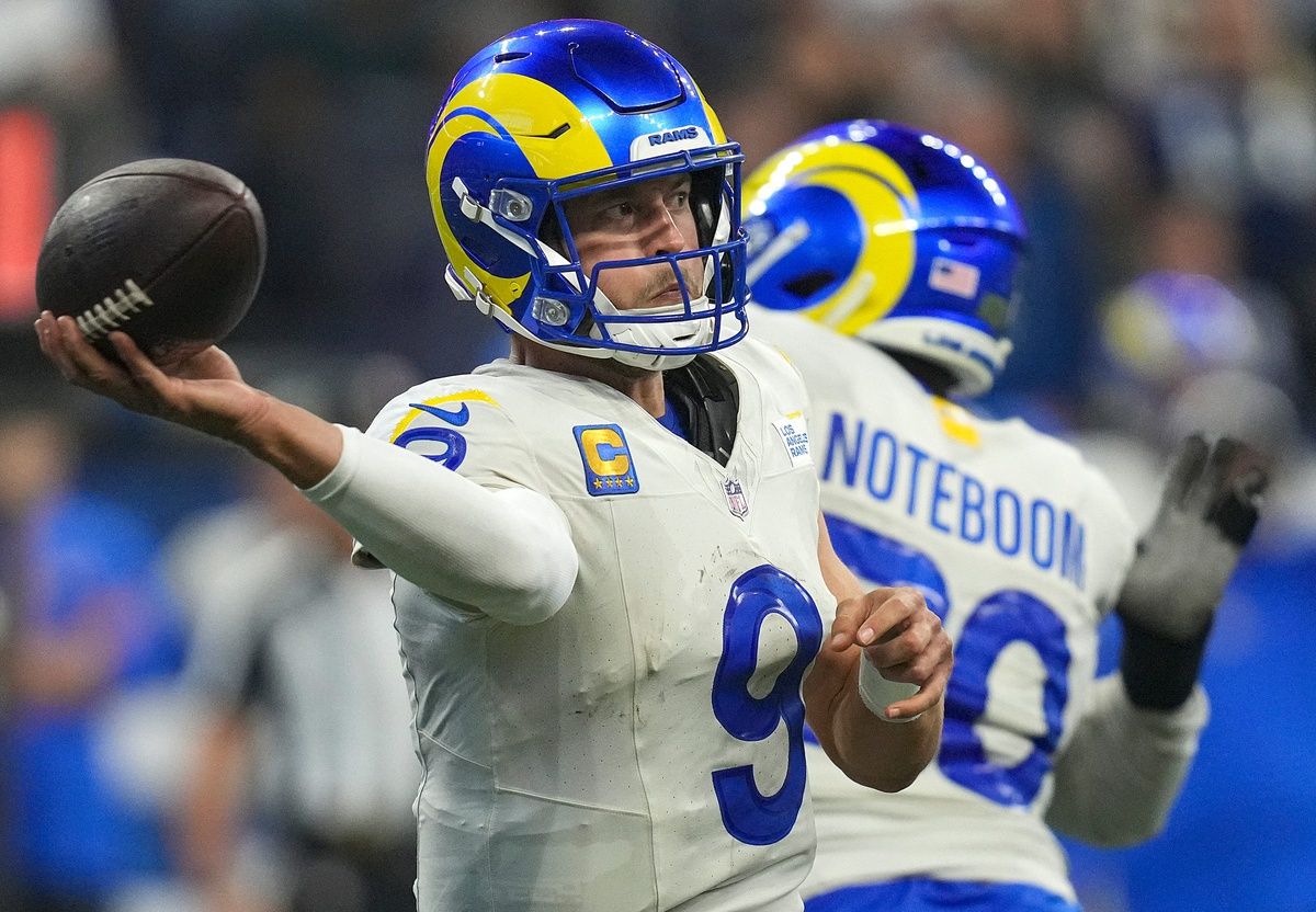 Matthew Stafford (9) passes during the second half.
