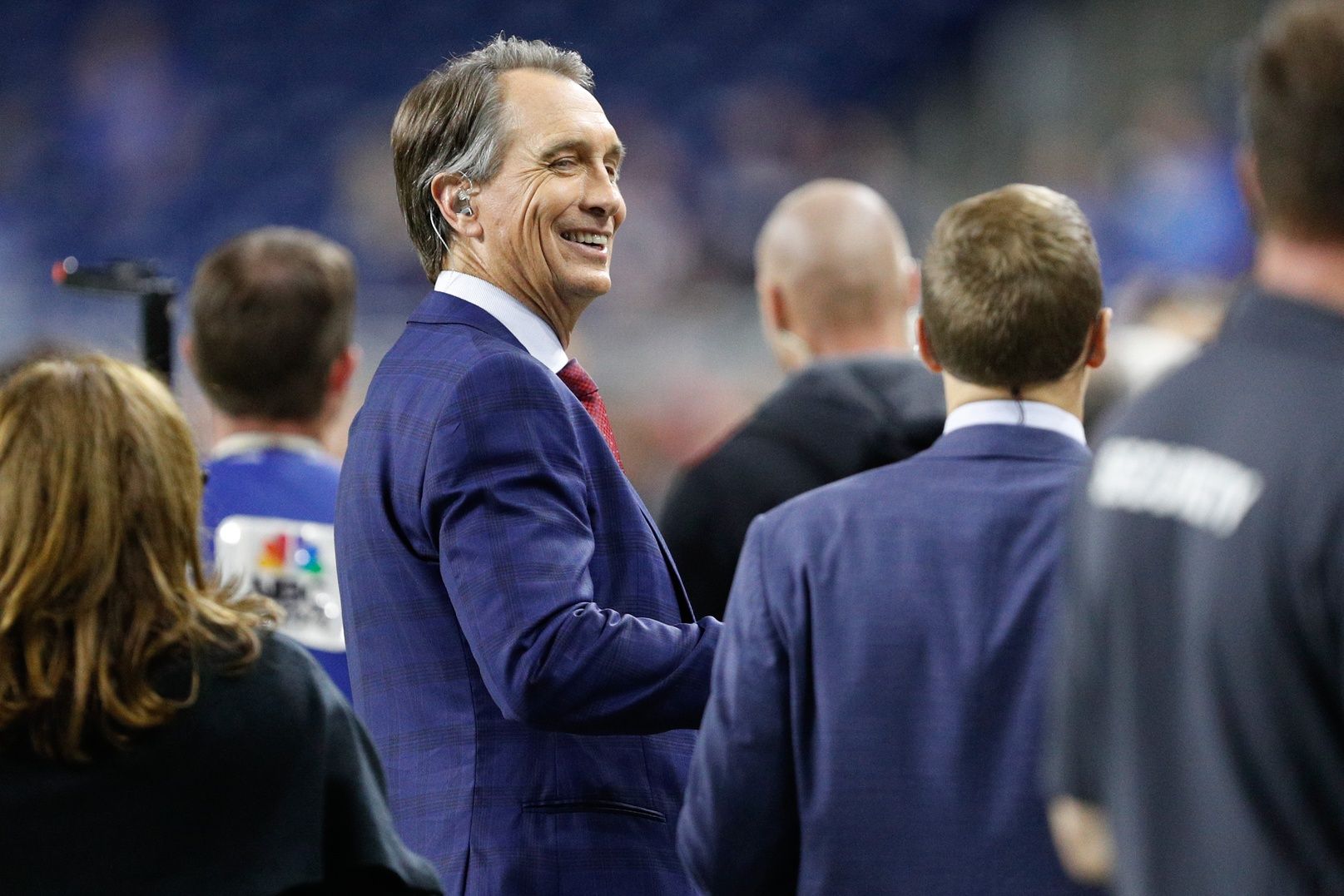 TV sportscaster Cris Collinsworth smiles before the game between the Detroit Lions and the New England Patriots at Ford Field.