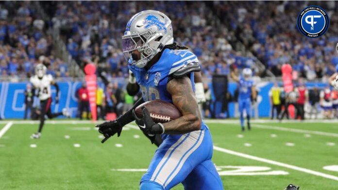 Jahmyr Gibbs (26) runs against Atlanta Falcons during the second half at Ford Field in Detroit.