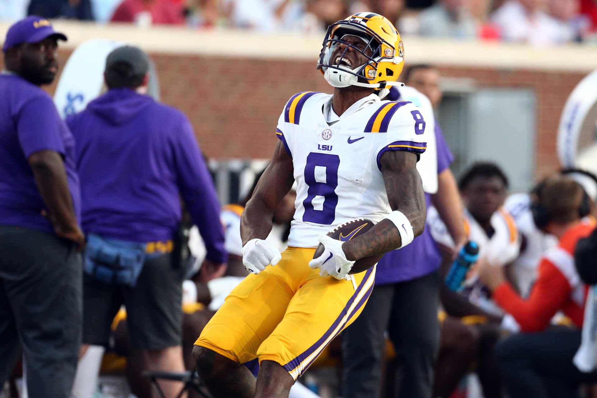 LSU Tigers wide receiver Malik Nabers (8) reacts after a first down during the first half against the Mississippi Rebels at Vaught-Hemingway Stadium.